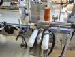 Automatic labeling machine for flat cylindrical bottles and jars Maqmundi