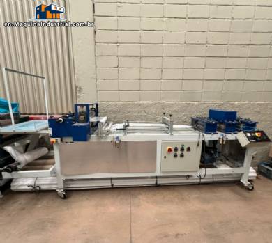 Line for manufacturing disposable non-woven shoe soles