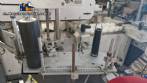 Automatic double head labeling machine for flat bottles Bauch Campos