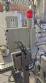 Automatic self-adhesive labeling machine for cylindrical bottles