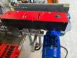 Automatic self-adhesive labeling machine for cylindrical bottles