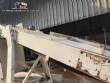 Inclined conveyor belt with talisca