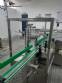 Linear filling machine with 12 filling nozzles