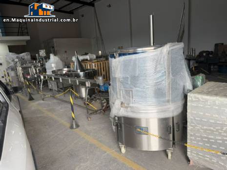 Milainox automatic rotary filling, dosing, and sealing machine for cups, pots, and jars.