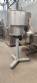 Complete filling line with Tecman Nelpas Tecnoenvase Tudela bottle filling, labeling, capping, and positioning machines for cosmetic liquids.