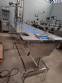 Stainless steel conveyor table with belt for accumulation assembly