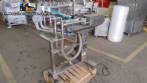 Filling machine with 2 nozzles for liquids and pilfer cap screwer