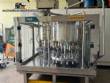 Stainless steel rotary filling machine with 16 IMSB nozzles for bottles and jars