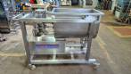 Unifiller stainless steel dosing pump with homogenizing mixer for bakery foods.