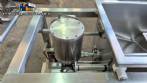 Unifiller stainless steel dosing pump with homogenizing mixer for bakery foods.
