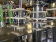 Gravimetric rotary filling machine in stainless steel with cabin