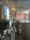 Gravimetric rotary filling machine in stainless steel with cabin