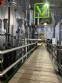 Gravimetric rotary filling machine in stainless steel with cabin