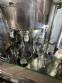 Gravimetric rotary filling machine in stainless steel with cabin