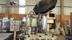 Monobloc rotary filling machine with 12 nozzles and screw capping machine