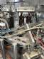 Automatic rotary dosing filling machine with sealer for Delgo cups, 3500 cups per hour.