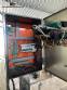 Automatic labeling machine for flat cylindrical bottles and jars Maqmundi