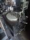 Erli rotary liquid filling machine with 4 pistons, 14,400 units per hour.