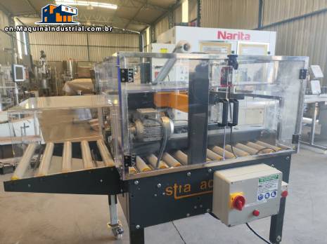 Adhesive tape case sealer with safety enclosure and door sensors Strapack