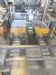 Adhesive tape case sealer with safety enclosure and door sensors Strapack