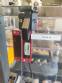 Adhesive tape case sealer with safety enclosure and door sensors Strapack