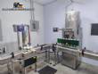 Aplimaq liquid screw-filling and rinsing line, 800 to 1000 liters per hour