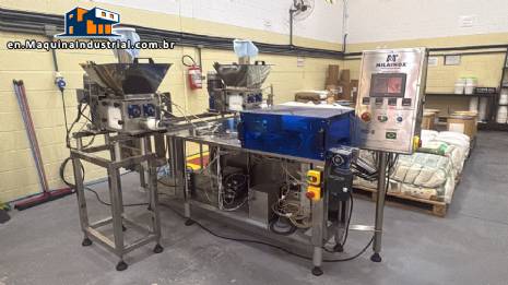 Extruder, filling and dosing machine with flow pack packaging machine, Milainox model year 2024.