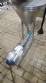 Netzsch positive displacement helical sanitary pump with feed hopper.