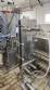 Continuous tunnel immersion pasteurizer for bottles and packaging - TECNINT