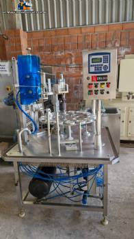 Stainless steel rotary sealer with aluminum seal for Delgo jars, cups and bottles.