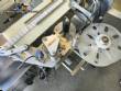 Labeling machine for dropper bottles with double printhead transparent stainless steel label