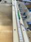 Labeling machine for dropper bottles with double printhead transparent stainless steel label