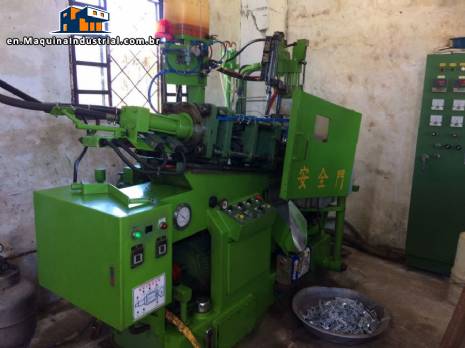 Factory line for the production of zipper sliders for clothing