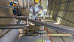 Inclined screw conveyor with stainless steel silo