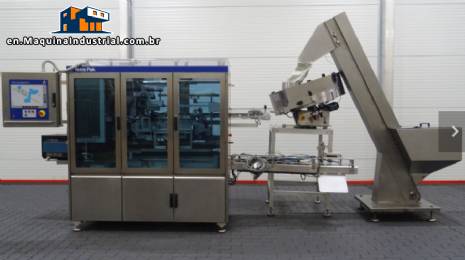 Automatic Tetra Cap Applicator 45 for helicap 27 caps and 1000 ml square Tetra Pak packaging.