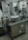 Rotary filling line for dropper bottles with Certo cylindrical self-adhesive labels