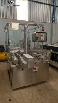 IMA F57 small vial filling, capping, and screw-capping machine for liquids, medicines, and supplements.