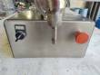 Countertop stainless steel filling machine for liquids and viscous liquids