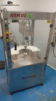 Rotmaq screw capping machine with cap positioning elevator