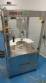 Rotmaq screw capping machine with cap positioning elevator