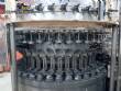 CompoMaq rotary filling machine with 42 nozzles and screw capper