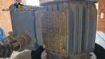 Labeling machine with steam sleeve tunnel and bottle baler