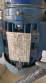 Labeling machine with steam sleeve tunnel and bottle baler