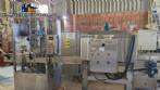 Labeling machine with steam sleeve tunnel and bottle baler