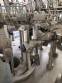 Zegla rotary filling machine with rinser and three-block capping system.