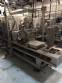 Automatic filling and sealing machine for gelatin cups, 12,000 units/hour.
