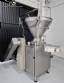 Handtmann vacuum stuffer with twister and tilting elevator, up to 6,000 kg per hour.