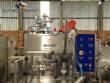 Stainless steel filling machine for beer liquids in Brabeer bottles