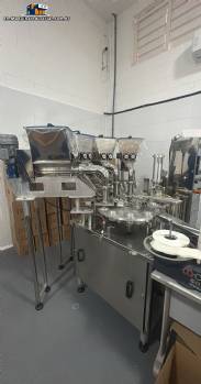 Rotary dosing and filling machine with stainless steel capping unit for pastes, 4 nozzles, Milainox, year 2022 Rotary dosing and filling machine with stainless steel capping unit for pastes, 4 nozzles, Milainox, year 2022